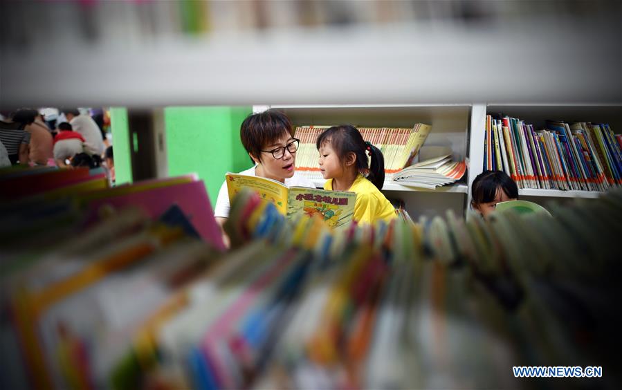 CHINA-HAINAN-SUMMER VACATION-LIBRARY-READING (CN)