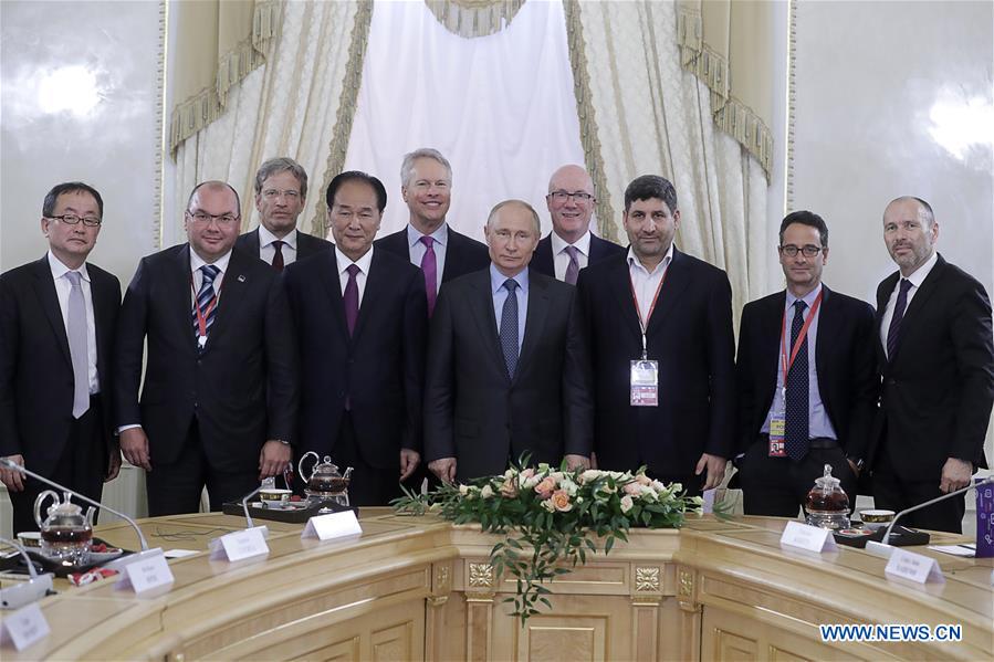 RUSSIA-ST. PETERSBURG-PUTIN-NEWS AGENCIES-MEETING 