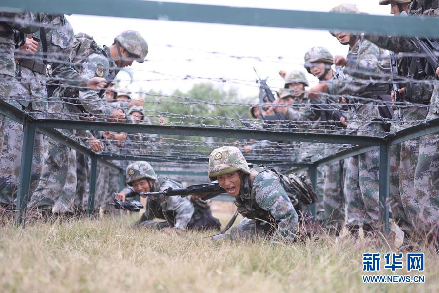 （在习近平强军思想指引下·我们在战位报告·图文互动）（3）千里移防，铁心跟党走——南部战区陆军第75集团军某红军旅政治建军、练兵备战记事