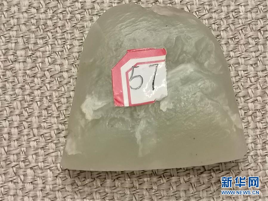 （文化视点·听文物讲故事·图文互动）（1）豪横！古人扛着玉斧在罗布泊打猎